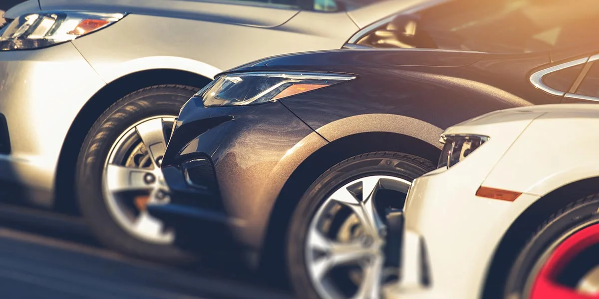 Row of vehicles in car dealership